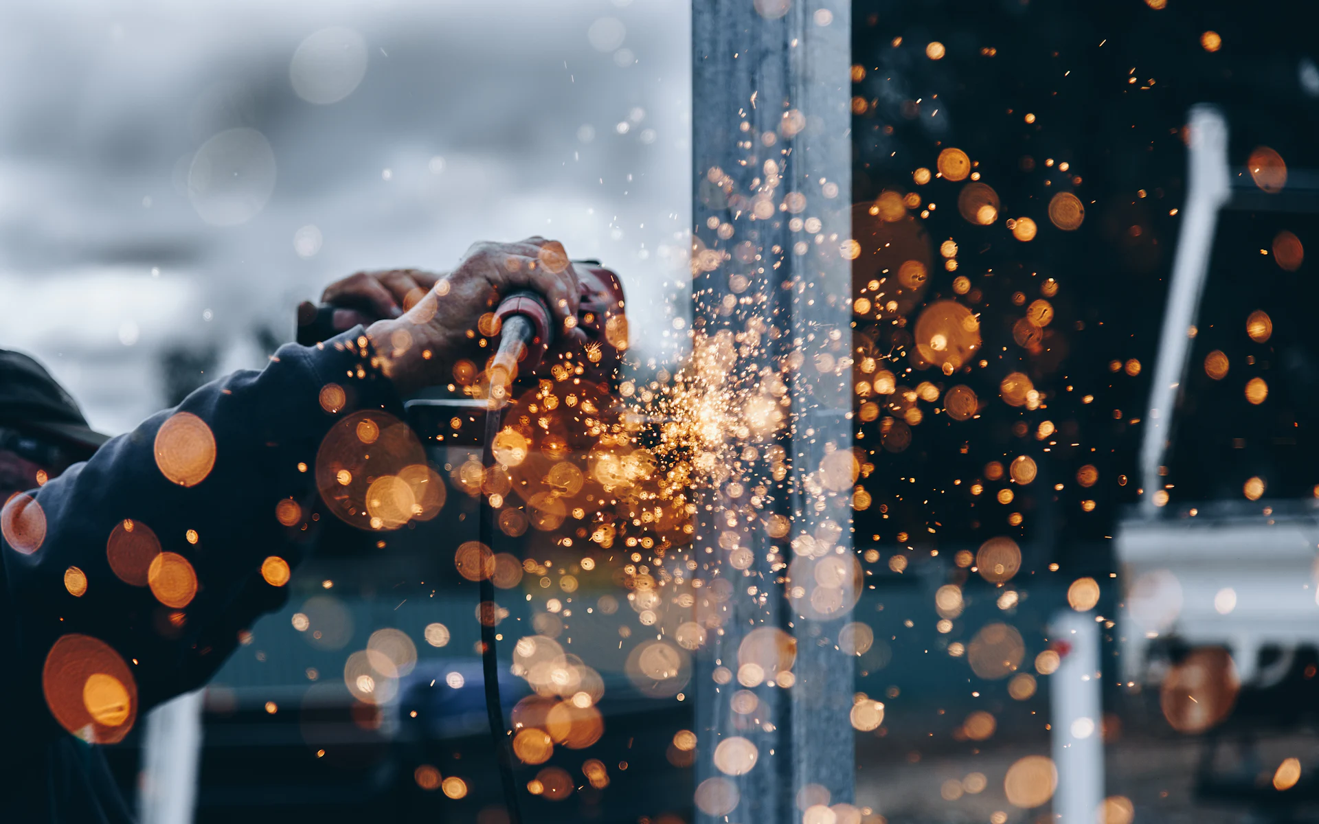 Metal grinding with sparks during fabrication work